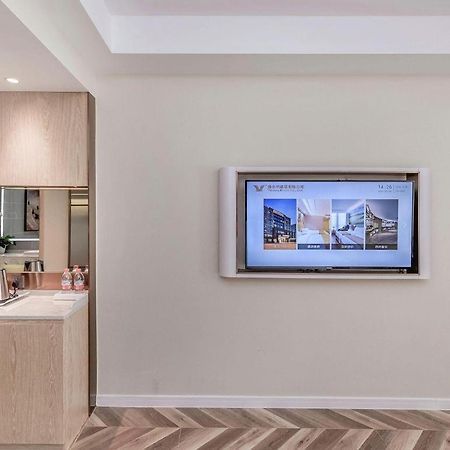 לוג'ו Vienna Hotel Sichuan Hejiang Yangtze River Bridge מראה חיצוני תמונה