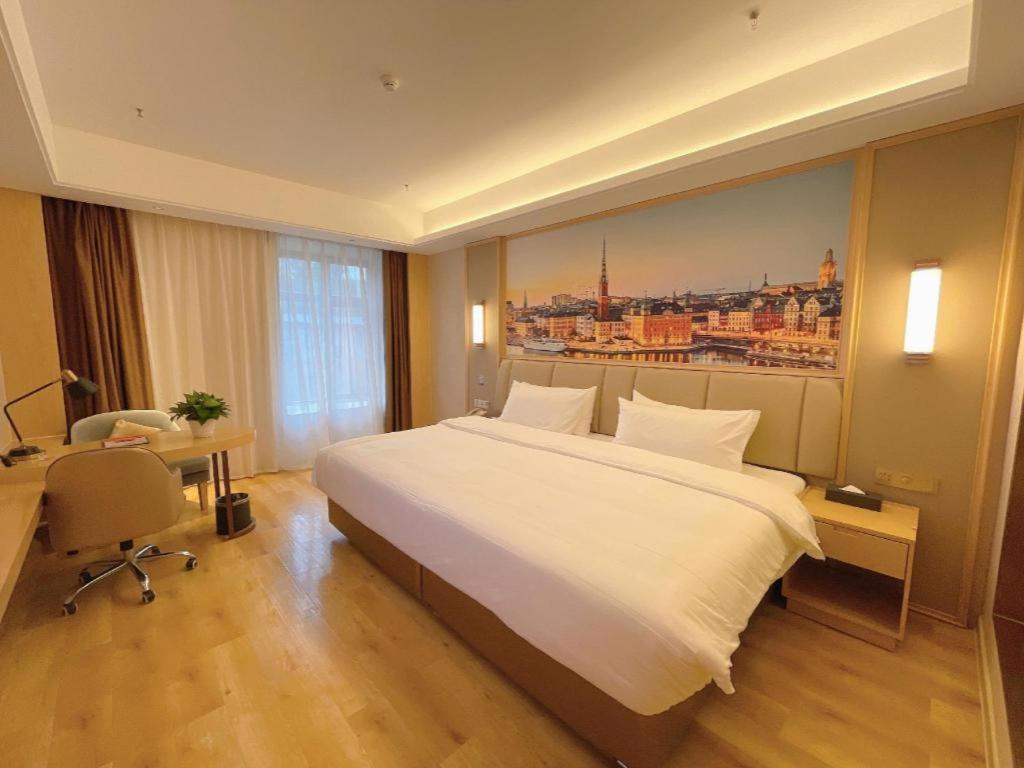 לוג'ו Vienna Hotel Sichuan Hejiang Yangtze River Bridge מראה חיצוני תמונה