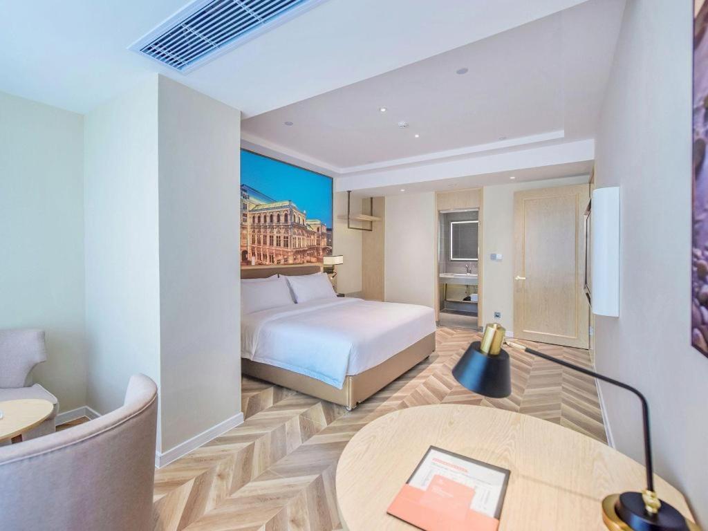 לוג'ו Vienna Hotel Sichuan Hejiang Yangtze River Bridge מראה חיצוני תמונה