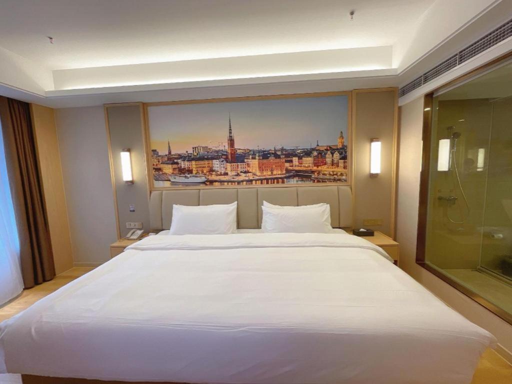 לוג'ו Vienna Hotel Sichuan Hejiang Yangtze River Bridge מראה חיצוני תמונה