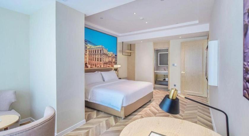לוג'ו Vienna Hotel Sichuan Hejiang Yangtze River Bridge מראה חיצוני תמונה
