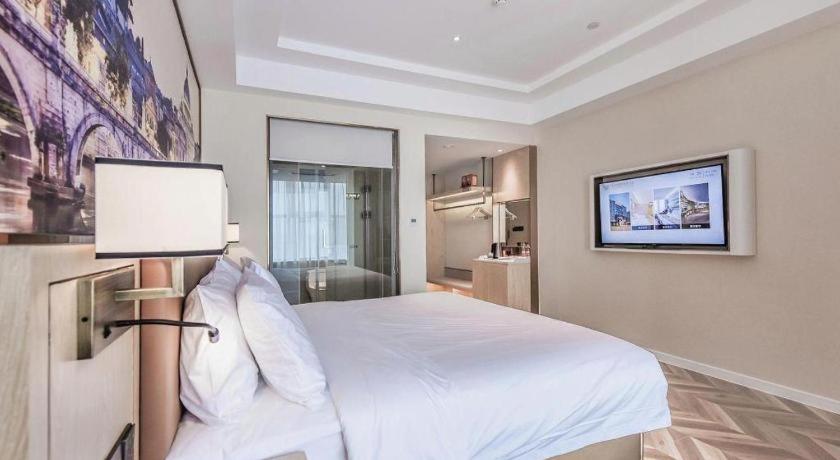 לוג'ו Vienna Hotel Sichuan Hejiang Yangtze River Bridge מראה חיצוני תמונה