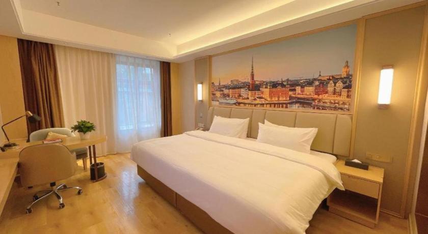 לוג'ו Vienna Hotel Sichuan Hejiang Yangtze River Bridge מראה חיצוני תמונה