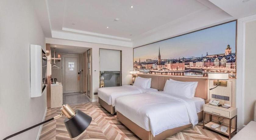 לוג'ו Vienna Hotel Sichuan Hejiang Yangtze River Bridge מראה חיצוני תמונה