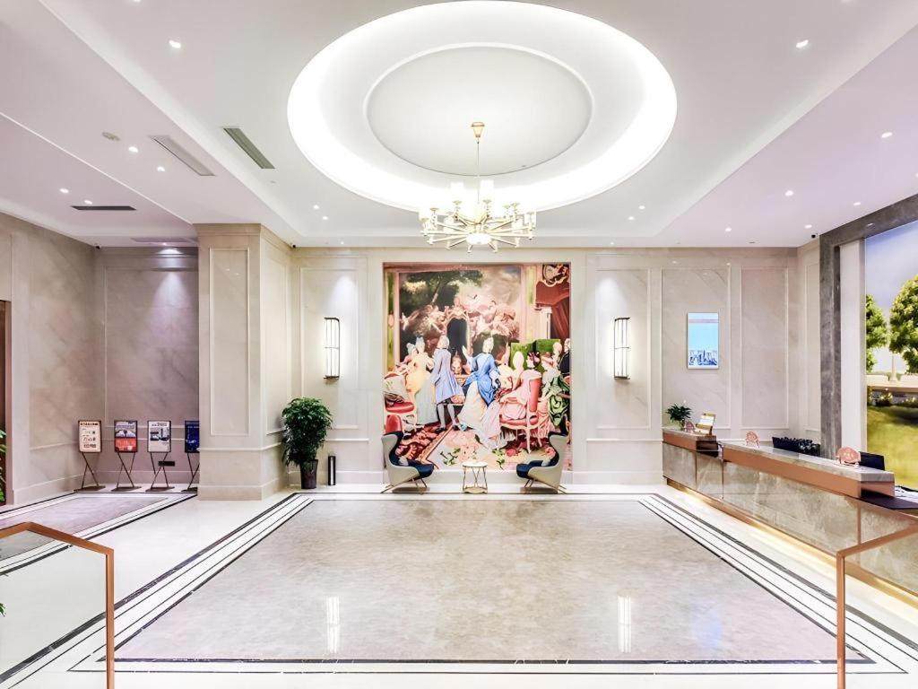 לוג'ו Vienna Hotel Sichuan Hejiang Yangtze River Bridge מראה חיצוני תמונה
