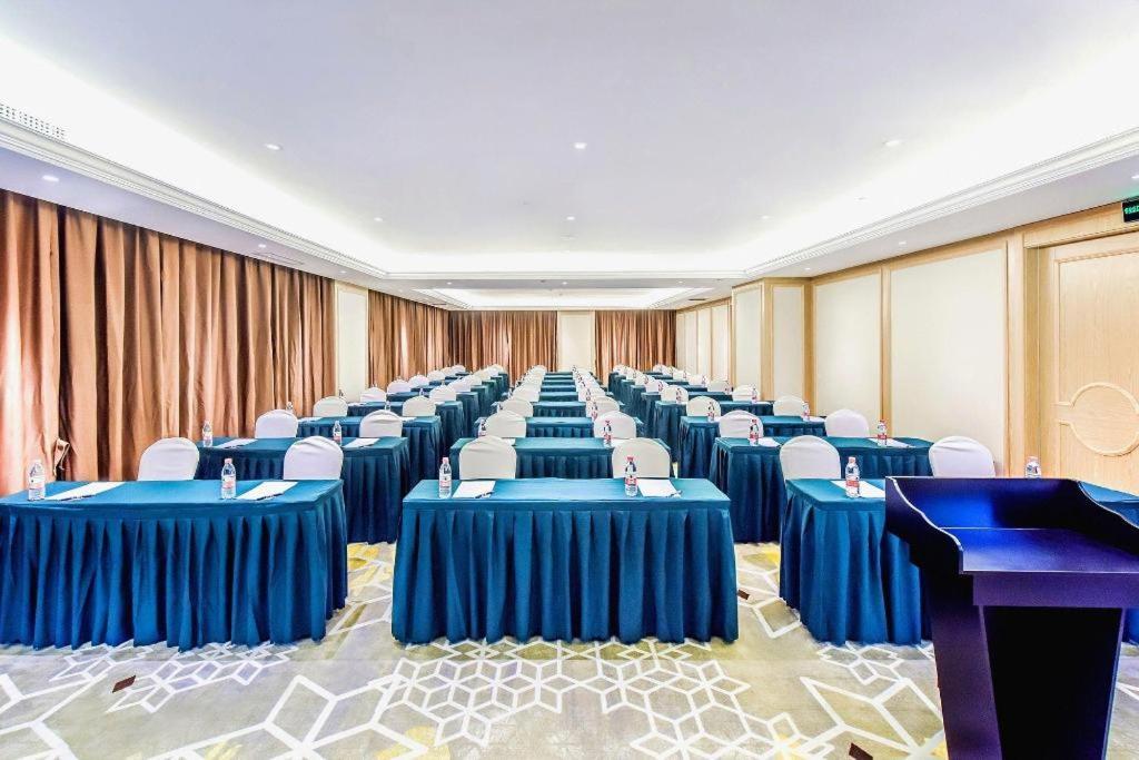 לוג'ו Vienna Hotel Sichuan Hejiang Yangtze River Bridge מראה חיצוני תמונה