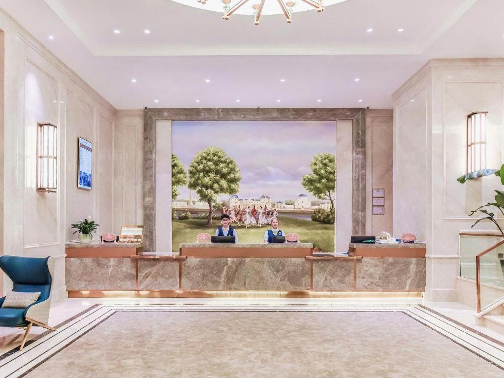 לוג'ו Vienna Hotel Sichuan Hejiang Yangtze River Bridge מראה חיצוני תמונה